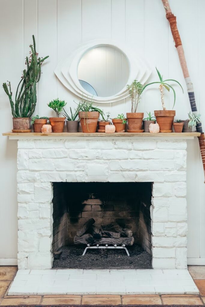 A picture of a stone-tiled fireplace