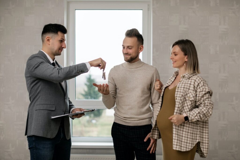 Effective Strategies for a Successful Real Estate Transaction Realtor Handing Over Keys