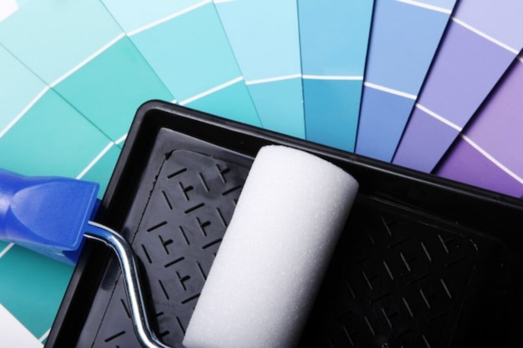 A photo of a colour palette catalogue with a focus on paint swatches specifically suited for bathrooms.